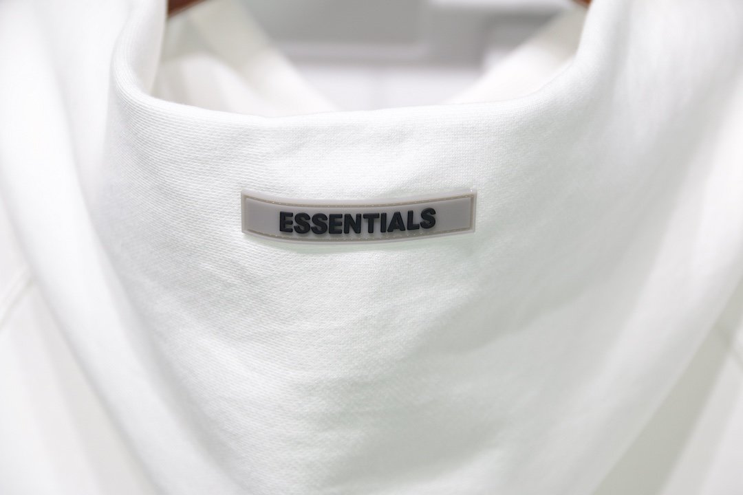 fear of god essentials pullover hoodie applique logo