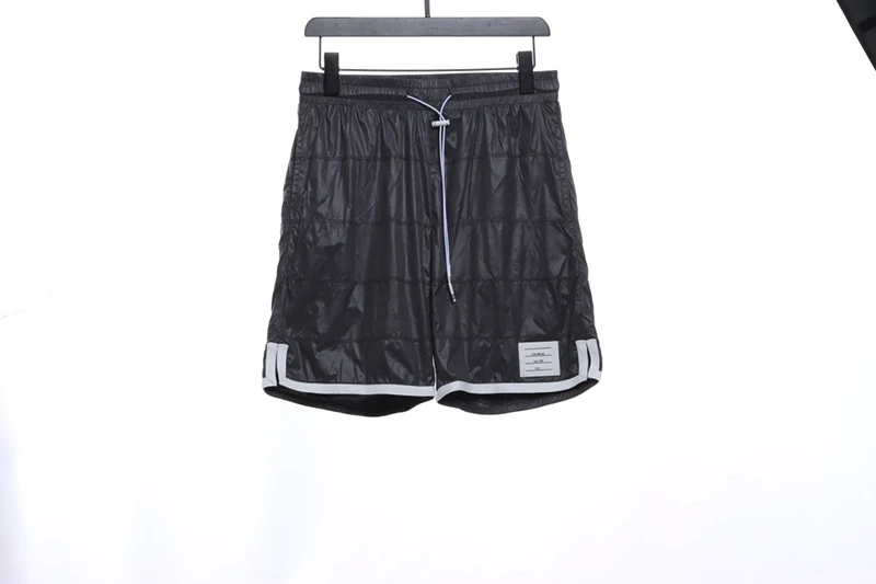 dark plaid nylon covered board shorts