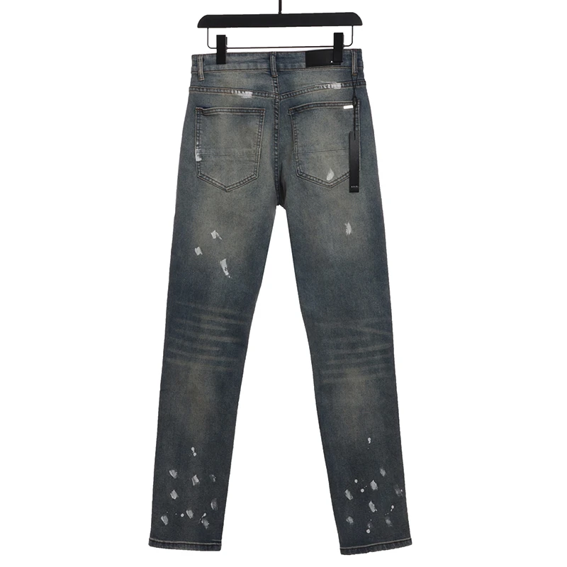 splashed ink and rhinestone jeans