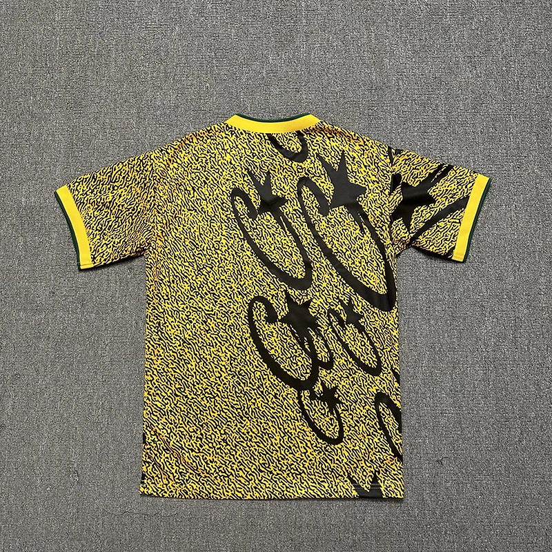 corteiz carni stellations football jersey ‘yellow’ reps